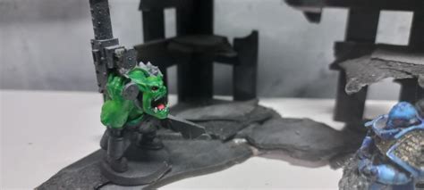 This is my first time painting some minis. I am not done painting the Ork. C&C are welcome! : r ...