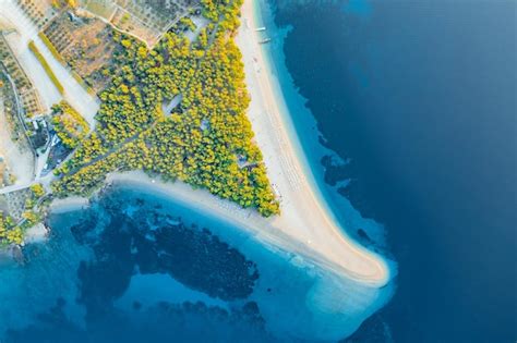 Premium Photo | Panoramic aerial view at the Zlatni Rat. Beach and sea from air. Famous place in ...