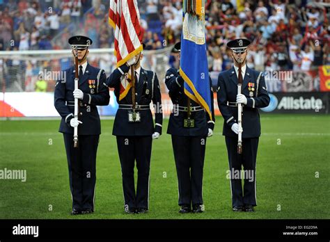 The Air Force Honor Guard Color Team present the colors before a Major ...