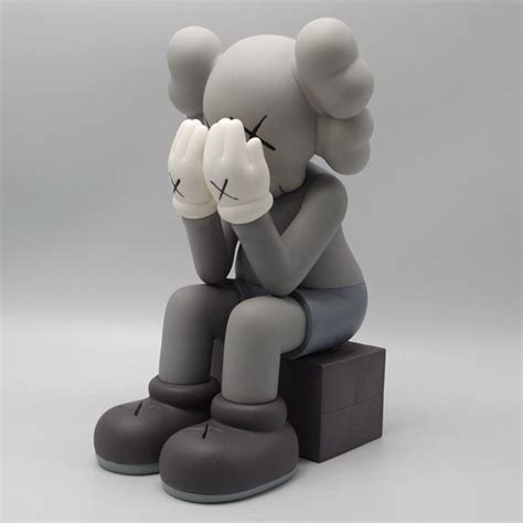 KAWS - Kaws Figures, sitting, 11in – Collector Camp