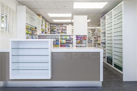 Pharmacy Shelving |Bespoke pharmacy shelves | Contrast Interiors in 2021 | Store design interior ...