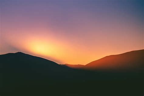 Silhouette of Mountain during Sunset · Free Stock Photo