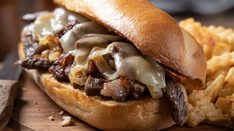 The Absolute Best Way To Prepare Onions For A Classic Philly Cheesesteak