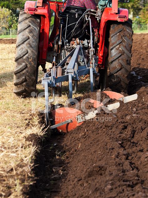 Tractor And Plough Stock Photo | Royalty-Free | FreeImages