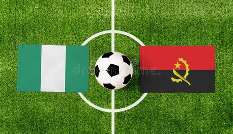 Top View Soccer Ball with Nigeria Vs. Angola Flags Match on Green ...