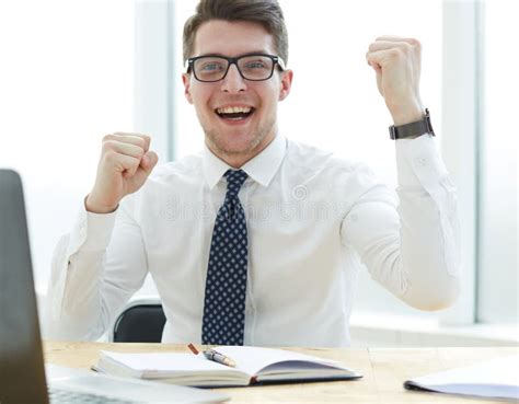 Happy Young Businessman Raising Hands in Front of Laptop at Office Desk Stock Image - Image of ...