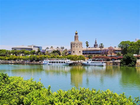 Guadalquivir River In Seville Photograph by Karol Kozlowski