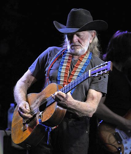 Willie Nelson, on guitar | www.stillisstillmoving.com