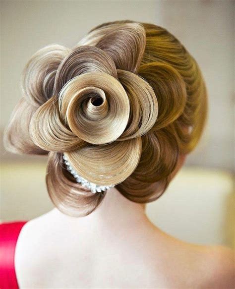 Flower bun hairstyle | Braided hairstyles for wedding, Rosé hairstyles, Glamorous hair