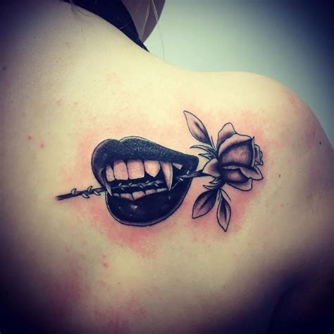 Vampire mouth & rose tattoo done today by Andy Clark @ baby boy tattoo studio. | Vampire tattoo ...