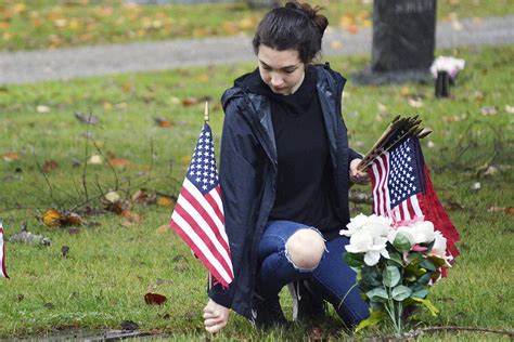 Flags planted in memory of fallen soldiers | HeraldNet.com