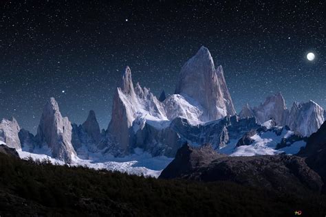 Starry Night Sky at Snowy Mountains 4K wallpaper download