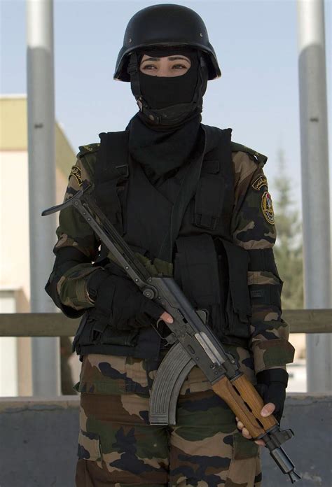 Masked female Commando of the Palestinian Presidential Guard during a ...