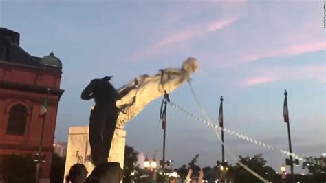 Baltimore protesters toppled a Christopher Columbus statue and threw it ...