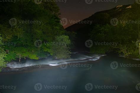 waterfalls in night 10428109 Stock Photo at Vecteezy