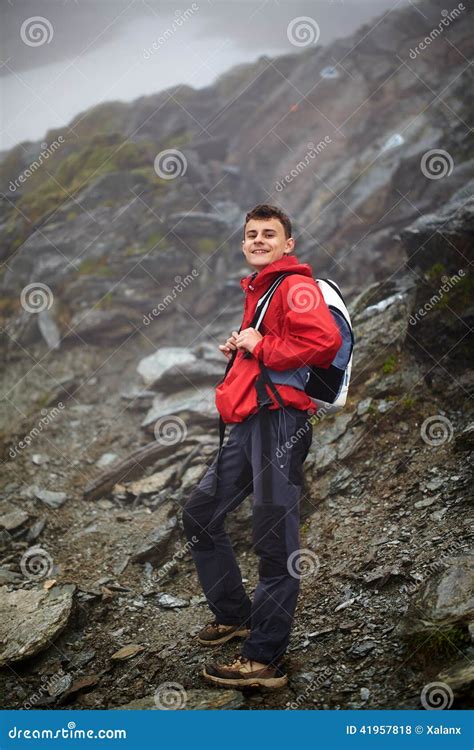 Teenage hiker on mountain stock photo. Image of coat - 41957818