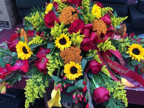 Casket piece with sunflowers, yarrow, roses, solidago and gladiolia. | Casket flowers, Funeral ...