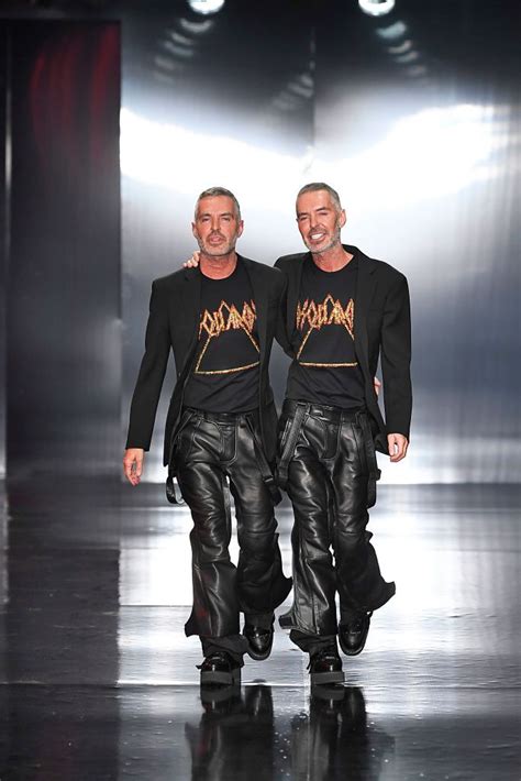 Fashion designers Dean and Dan Caten walk the runway at the Dsquared2... | Mens winter fashion ...