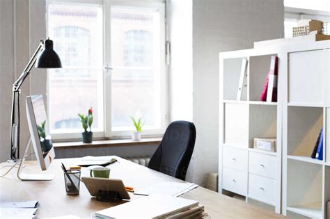 Desk in empty office stock photo