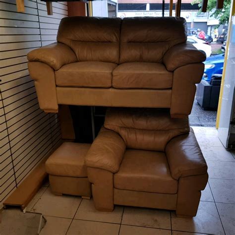 2 seater sofa armchair and puffee in tan leather - Whelans Quality Used Furniture