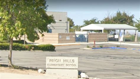 Shots fired toward Pinon Hills Elementary School led to arrest of man.