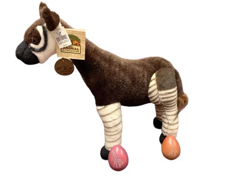 Lot - Disney’s Animal Kingdom Plush Okapi and (2) Stone Eggs with ...