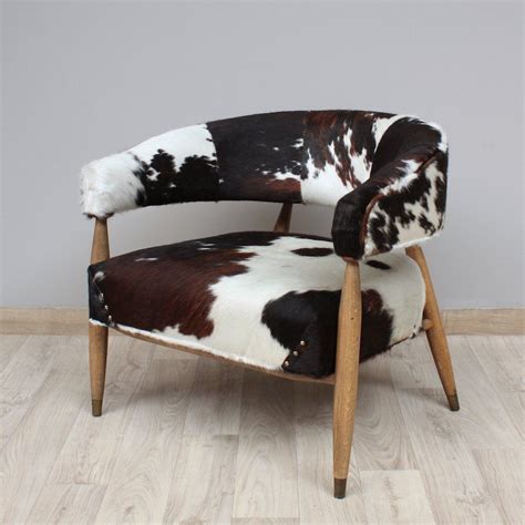 These fabulous cowhide chairs are made from oak and natural cowhide and ...