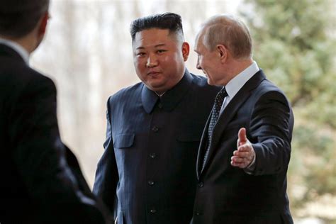 The Latest: Putin, Kim shake hands before start of talks