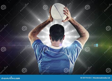 Composite Image of Rugby Player about To Throw a Rugby Ball Stock Image - Image of sport ...