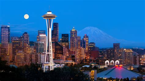 Downtown Seattle skyline and Space Needle at night with full moon, Washington State, USA ...