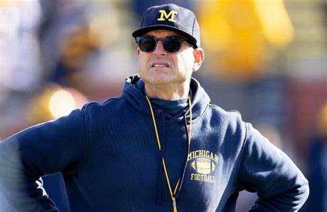 Jim Harbaugh helps clear fallen tree in Michigan ice storm - Today's ...