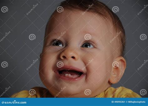 Cute baby with 2 teeth stock image. Image of caucasian - 49095361