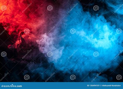 Colored Smoke Isolated On A Black Background. Blue And Pink Clouds ...