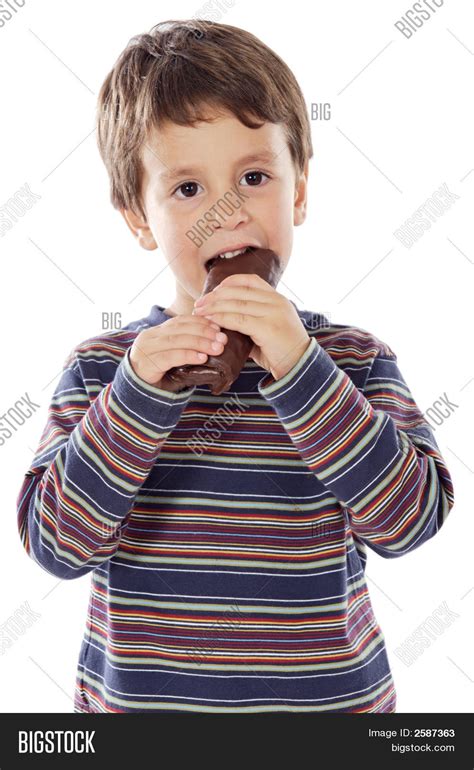 Child Eating Chocolate Image & Photo (Free Trial) | Bigstock