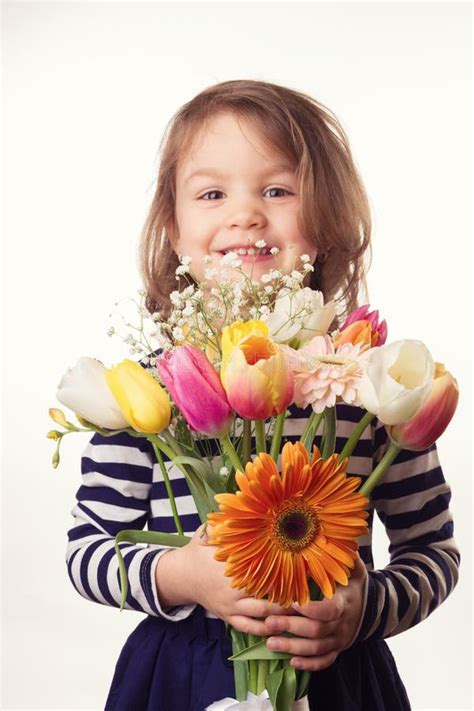 Cute Child Holding Fresh Spring Flowers Stock Image - Image of ...