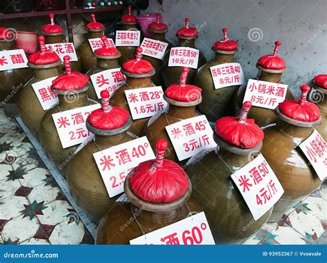 Jugs with Local Alcohol Drinks on City Market Editorial Photography ...