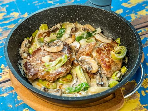 Pork Steak with Saucy Leeks and Mushrooms