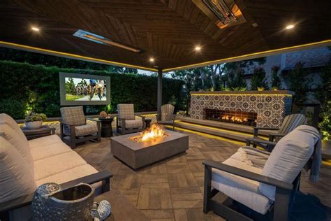 Beautiful Patio Designs With TVs And Cozy Furniture