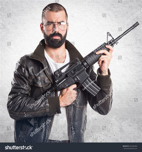 Free photo: Man Holding Rifle - Action, Military, Uniform - Free Download - Jooinn