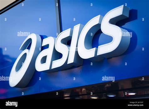 Asics logo sign on building Stock Photo - Alamy