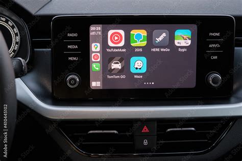 Apple CarPlay screen in the car dashboard. Youtube music, Waze, 2GIS ...