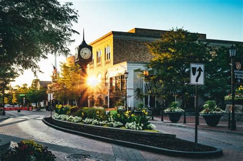 Northville Clock Glowing in the Sunrise Stock Image - Image of bell, late: 283839635