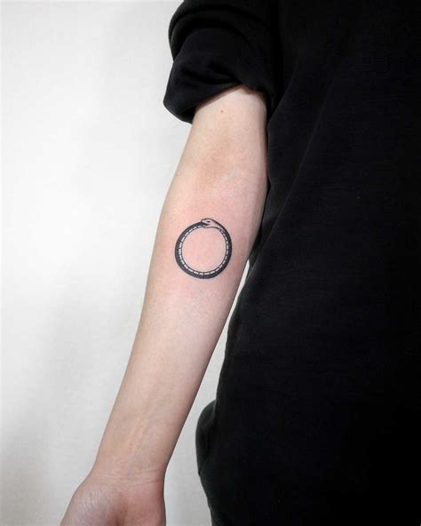 Simple Ouroboros tattoo by Ann Gilberg - Tattoogrid.net