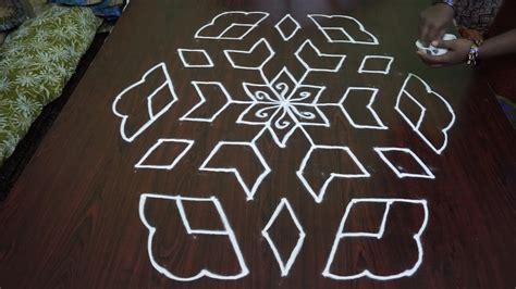 kolam with 13 dots || 13 pulli kolam || 13 to 7 pulli kolam || pulli kolam rangoli designs - YouTube