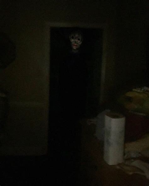 Creepy Art: Dark Room with a Mysterious Figure