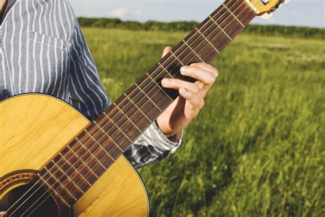 Free Images : hand, grass, music, field, acoustic guitar, land, country, musician, guitar player ...