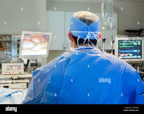 Appendix removal surgery. Surgeon performing a laparoscopic (keyhole ...