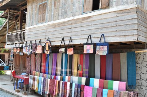 Laotian bags and scarves on display at the 'whisky village… | Flickr