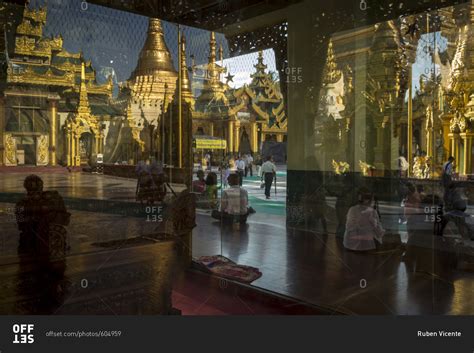 Yangon, Myanmar - 19 September 2016: Reflections inside Shwedagon ...