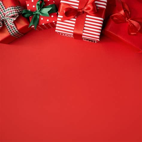 Free Photo | Red Christmas presents on red